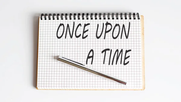 Notebook with pen and Notes about Once upon a time