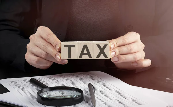 Businesswoman Holding Wooden Block Text Tax Business — Stock Photo, Image