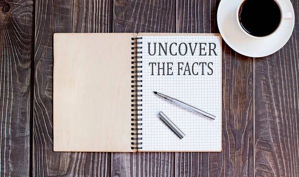 Word Uncover Facts Pen Cofee Business — Stock Photo, Image