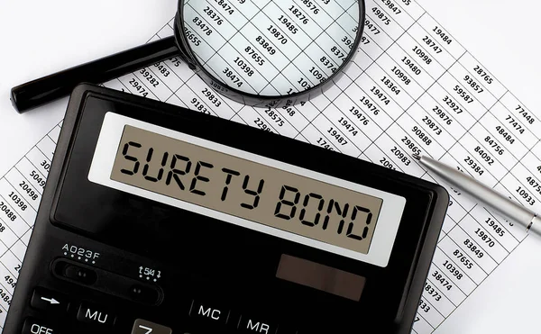 Palavra Surety Bond Calculadora Conceito Empresarial Fiscal — Fotografia de Stock