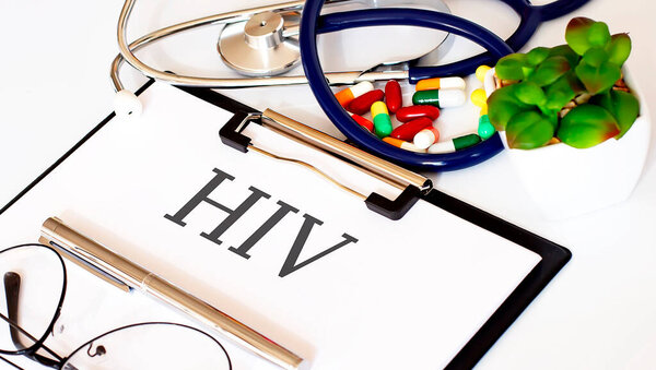 HIV text with Background of Medicaments, Stethoscope