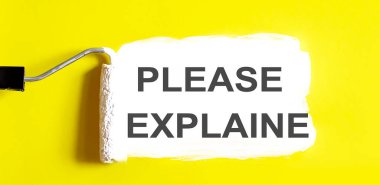 Lütfen açıkla bana. Sarı arka planda beyaz fırçalı açık bir boya kutusu. Üst görünüm.