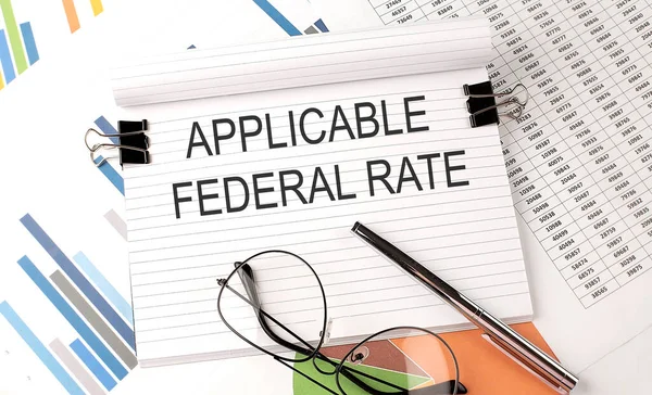 Notebook Text Applicable Federal Rate Table Charts Pen Glasses — Stock Photo, Image