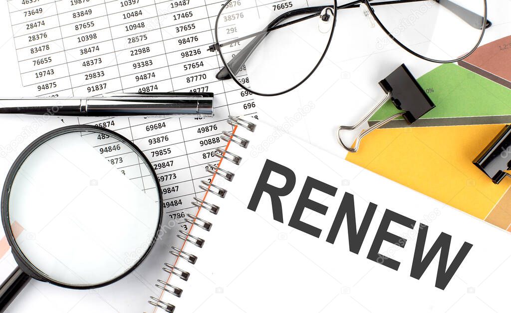 RENEW - the inscription of text on Notepad, and chart. Business concept