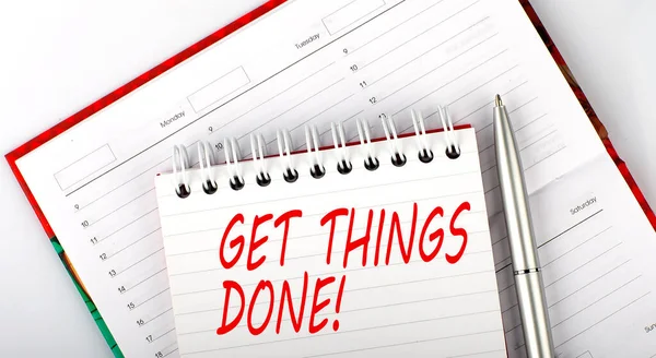 GET THINGS DONE text on notebook on diary,business