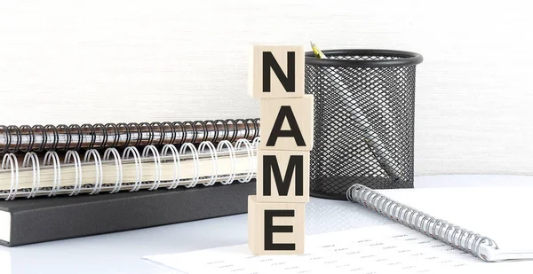 Name Text Wooden Block Notebooks White Background — Stock Photo, Image