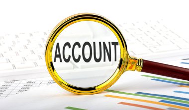 Magnifying glass with the word ACCOUNT on chart background