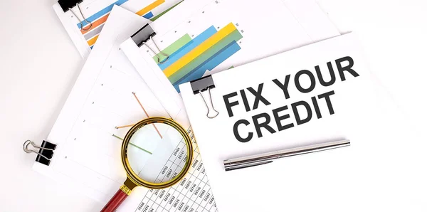 Fix Your Credit Tekst Białym Papierze Jasnym Tle Wykresów Papieru — Zdjęcie stockowe