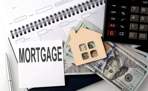Mortgage Επιγραφή Του Κειμένου Στο Αυτοκόλλητο Για Σχεδιασμό Δολάρια Και — Φωτογραφία Αρχείου