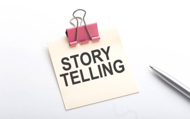 Beyaz arkaplanda kalemle çıkartma üzerine Öykü Anlatılıyor