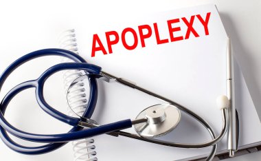 Kalem ve steteskop ile APOPLEXY metin defteri, mediina