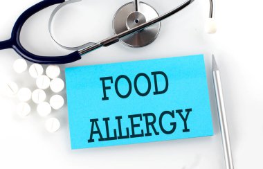 Masada steteskoplu, haplı, kalemli, tıbbi konseptli Gıda 'ya mesaj at..