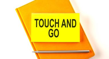 SMS TOUCH ve sarı defter üzerindeki çıkartmaya git