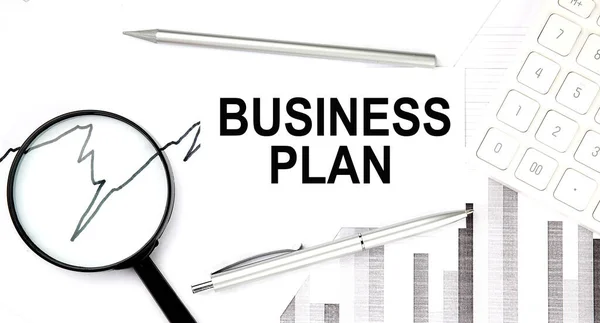 Business Plan Document Pen Graph Magnifier Calculator Businesss — Stock Photo, Image