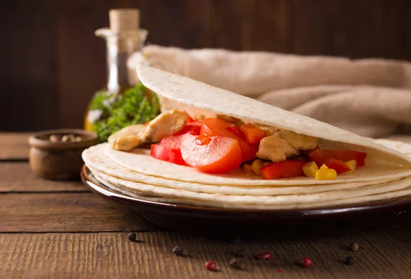 Homemade tortilla on wooden table — Stock Photo, Image