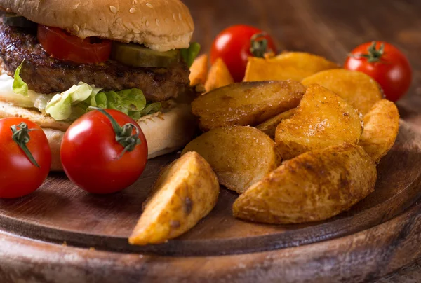 Hamburger and potato — Stock Photo, Image