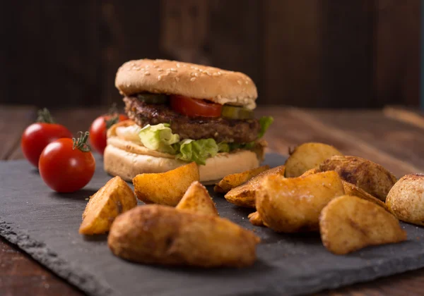 Hamburger and potato — Stock Photo, Image