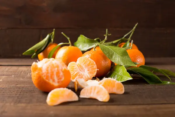 Clementines on wooden table — Stock Photo, Image