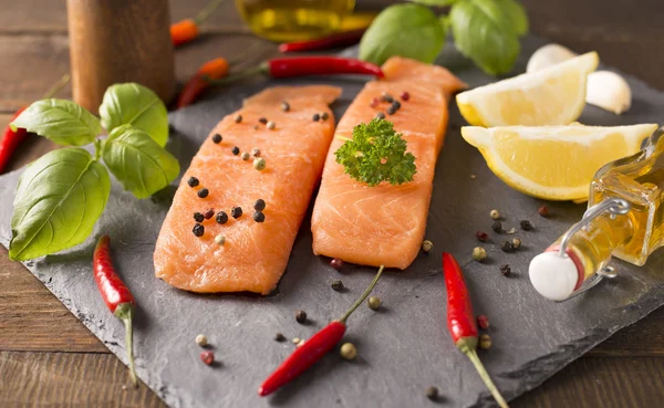 Fresh salmon with spices — Stock Photo, Image