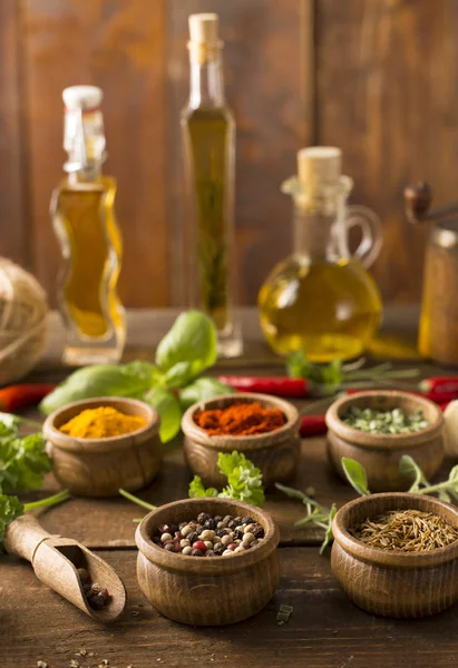 Powder spices on wooden table — Stock Photo, Image