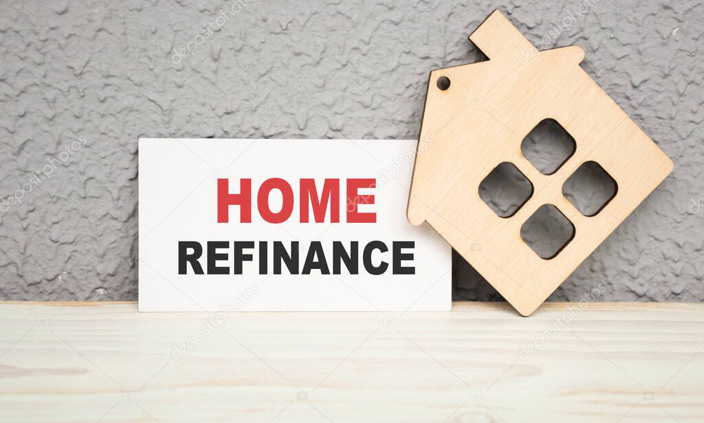 holding a card with text Home refinance