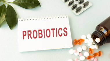 PROBİOTİK tıp konseptine sahip not defteri, DÜŞÜNÜLDÜ TABLETLER