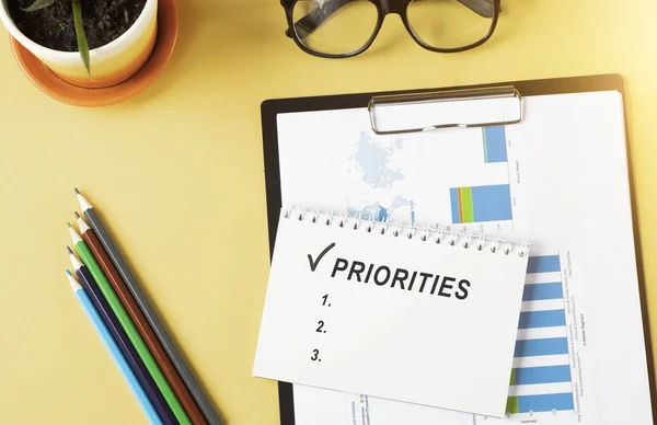 Prioritiess Text Written Notebook Pencils Graphs — Stock Photo, Image