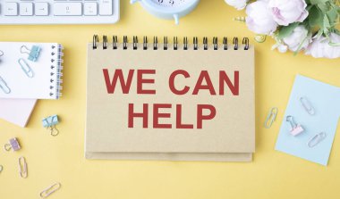 Sarı kare arkaplanda We Can Help ile yazılmış notlar.