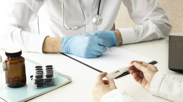 Doctor consulting patient hands closeup. Patient sitting at doctor office. Diagnostic, prevention of women diseases, healthcare, medical service, consultation or education, healthy lifestyle concept