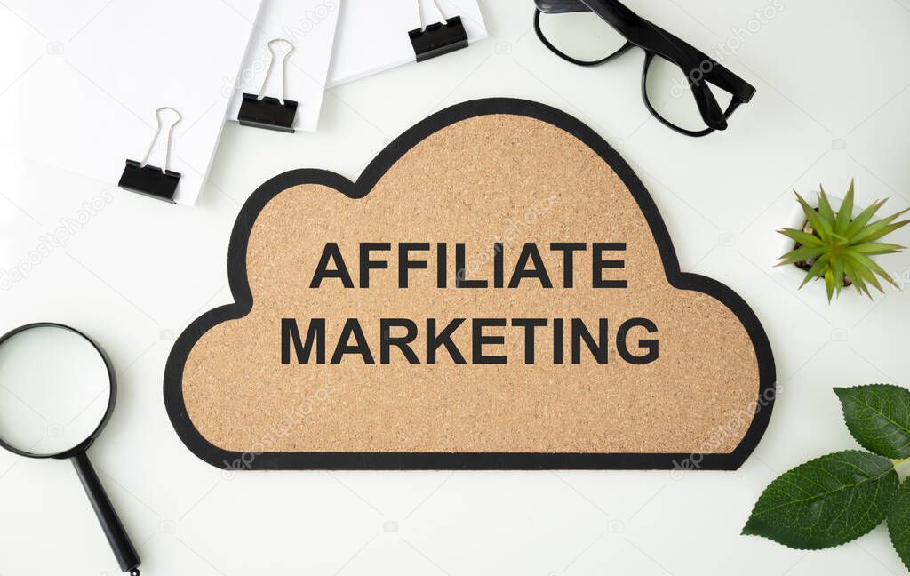 word or tag cloud labeled Affiliate Marketing. Documents and office supplies around the inscription.