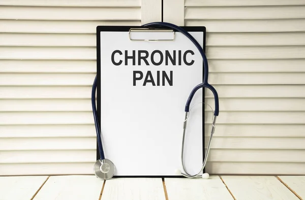 CHRONIC PAIN , Stethoscope, mix therapy drugs doctor and selectfocus