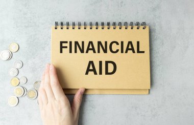 Elle yazılmış bir deftere mali yardım metni