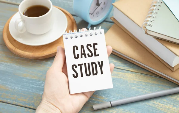 Case study memo written on a notebook with pen
