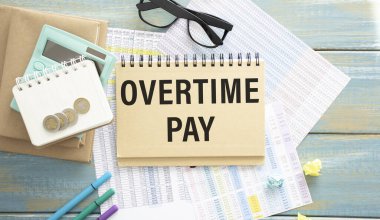 El yazısıyla yazılmış kelimeleri gösteren metin işareti Fazla mesai ücreti