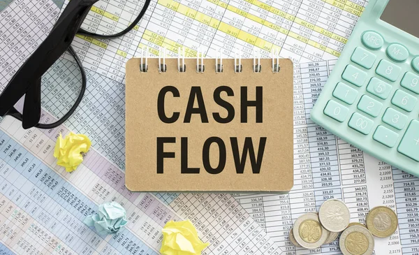 text Cash Flow on white business card. Business conceptual.