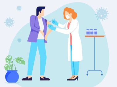 Erkek çocuğa aşı yapan kadın doktor.