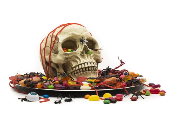 Halloween party with trick or treat candy skull dish — Stock Photo, Image