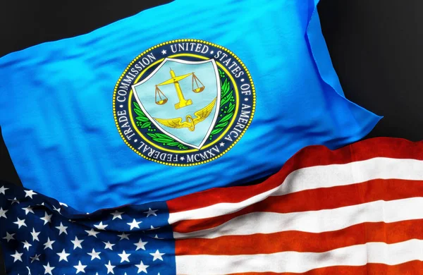 Birleşik Devletler Federal Ticaret Komisyonu 'nun bayrağı, Amerika Birleşik Devletleri bayrağıyla birlikte, aralarındaki bir bağlantının sembolü olarak, 3D illüstrasyon
