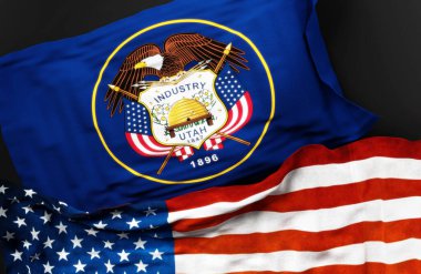 Utah eyaleti bayrağı ve Amerika Birleşik Devletleri bayrağı, aralarındaki bir bağlantının sembolü olarak, 3D illüstrasyon.
