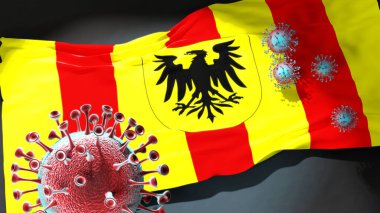 Mechlin 'deki Covid - Coronavirus bu şehirdeki virüs salgınıyla mücadele sembolü olarak Mechlin' in şehir bayrağına saldırıyor.