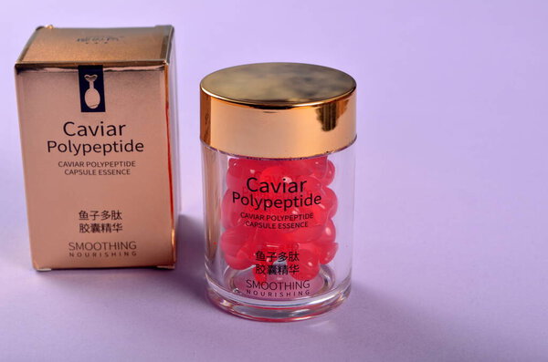 Riga, Latvia - January 20, 2021: Bottle with Polypeptide Capsule Caviar Essence Liquid Dilutes Fine Lines Brightening Moisturizing Whitening Essence Skin Care 