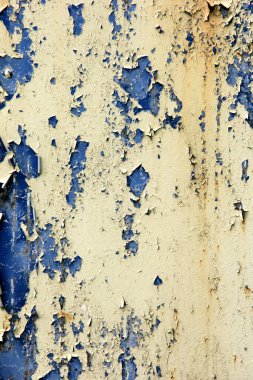 Paslı yüzey arka planı. Aşınmış metal zemin. Paslı mavi boyanmış metal duvar. pas ve eski mavi ve sarı boya metal bir yüzeyde. 