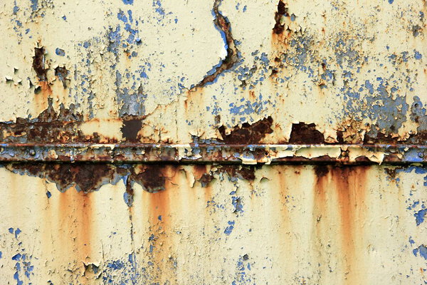 Rusty surface background. Corroded metal background. Rusted blue painted metal wall. rust and old blue and yellow paint on a metal surface. 