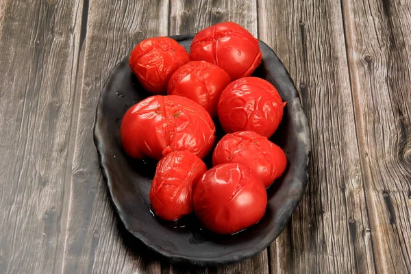 Blanched Red Tomatoes Black Clay Plate Ready Peeling Group Boiled — Stock Photo, Image