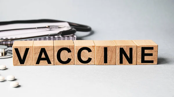 Inscripción Vacina Sobre Cubos Madera Aislados Sobre Fondo Blanco Concepto — Foto de Stock