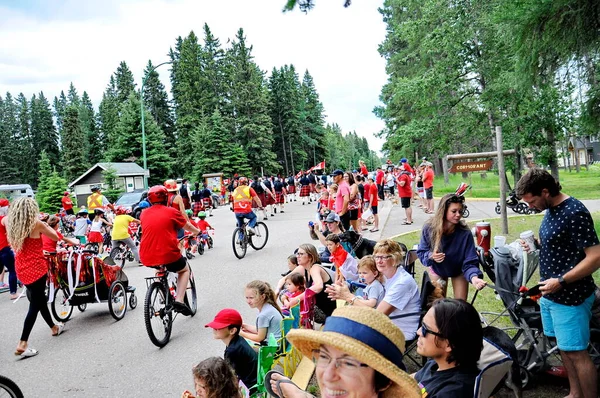 Waskesiu, Saskatchewan, Canada - July 1, 2019: Colorful parade floats and people take part in a parade to celebrate Canada Day in Prince Albert National Park.