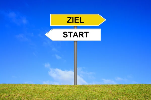 Signpost is showing start and goal german — Stock Photo, Image