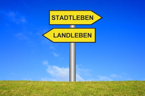 Signpost - City Life or country life — Stock Photo, Image