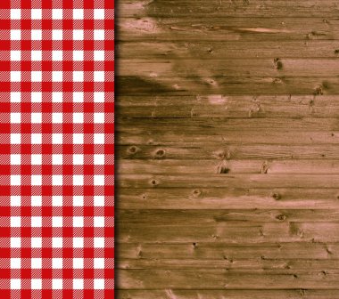 Traditional wooden background with red white tablecloth clipart