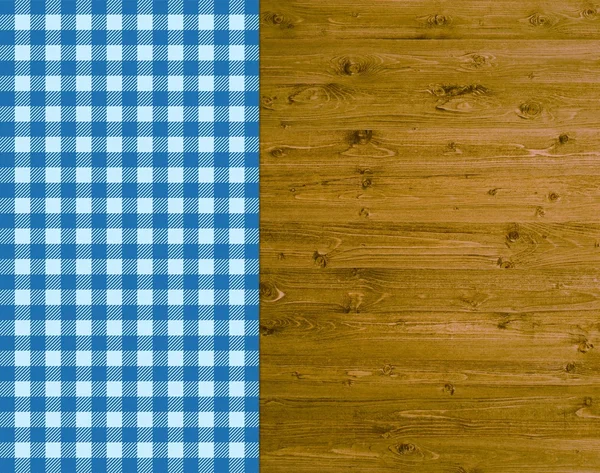 Traditional wooden background with tablecloth light blue and dark blue — Stock Photo, Image